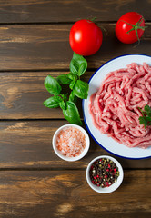 minced meat on wooden surface
