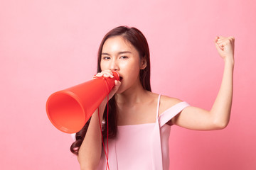 Beautiful young Asian woman show OK  announce with megaphone.