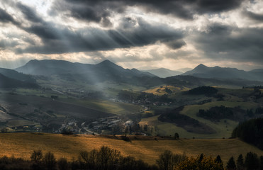 Sun rays over autumn country