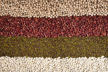 Pattern with white beans, red beans, mung and chickpea. Horizontal. Top view.