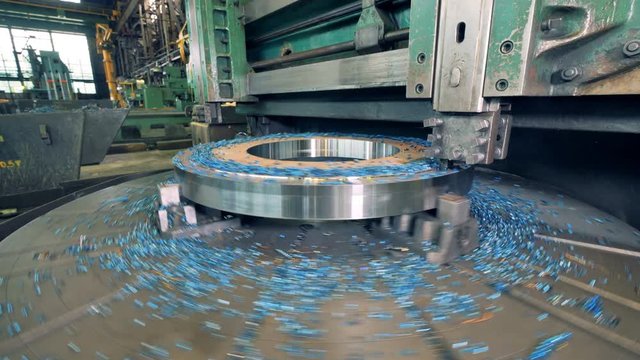 A big grinding machine in work. Metalworking CNC milling machine.
