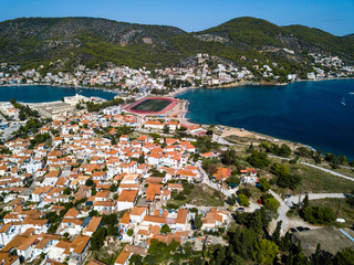 View of houses and sea marina on Poros island, Aegean sea, Greece.