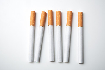 closeup of cigarettes alignment on white background