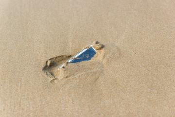 Mobile phone floated to the sea at the beach concept water damage