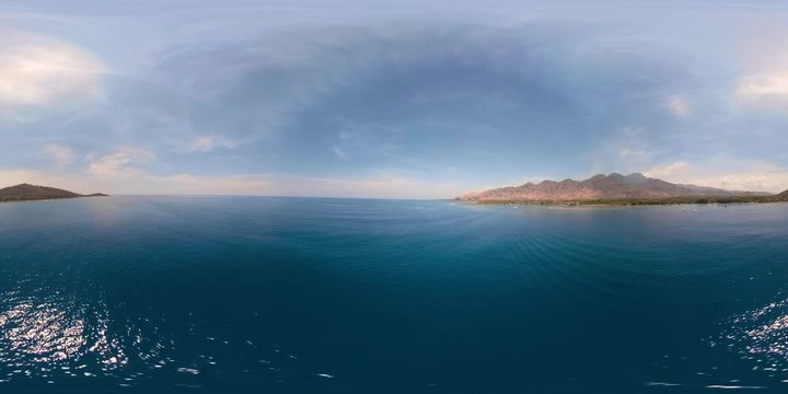 vr360 sea coast with tropical beach. aerial view tropical landscape, sea, mountains, boats on the surface of the water. Bali,Indonesia, travel concept. aerial footage