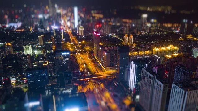 night time shenzhen city downtown traffic street aerial panorama 4k tilt shift timelapse china
