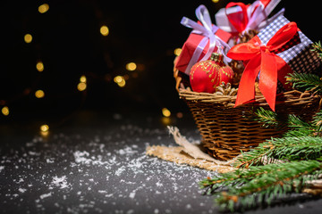 Dark magic background card for Christmas or New Year. Bright blurry lights of a garland. Place for...