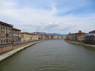 View on a river with colorful houses on its side