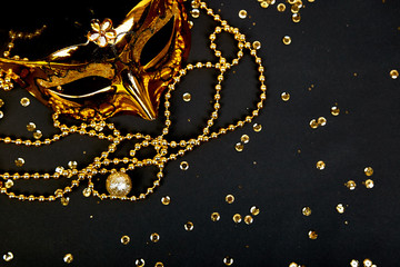 Black and gold carnival mask. Top view