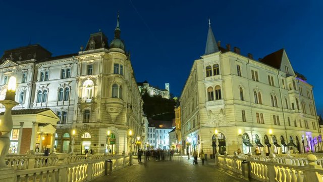Ljubljana City Centre at night, hyperlapse timelapse video. Preseren Square,Triple Bridge and view of Castle at night from Bridge, Slovenia.