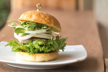 Homemade burger on the wooden table