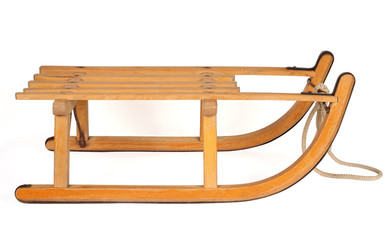 wooden sledge isolated over white background