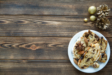 Tradition Christmas cake. Golden Christmas decorations, free space for text.