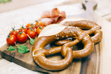 Pretzel concept on bright wooden table