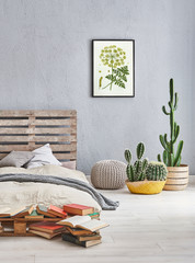 Pallet headboard bed, frame grey puff and vase of plant. book style.