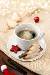 Obraz na płótnie Canvas Christmas tree Cookie and coffee cup. Red decoration.