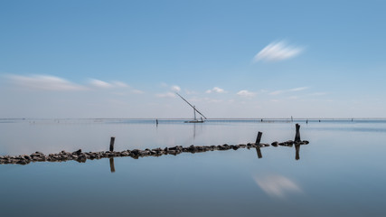 Sailboat reflection in burullus lake Egypt