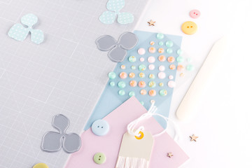 Fototapeta premium Making diy project. Paper decoration. Craft tools and supplies for scrapbooking. Season home flower decor.