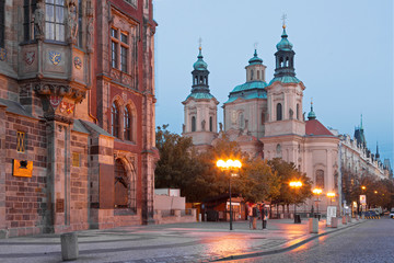 Fototapeta na wymiar Prague - The Old Town hall, Orloj, Staromestske square and St. Nicholas church at dusk.