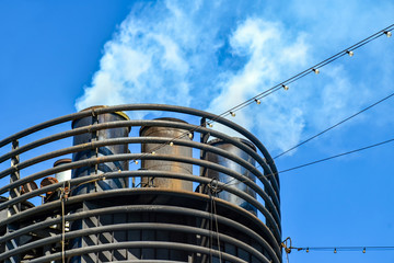 From the chimney of a cruise ship escape smoke and exhaust fumes