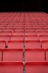 Naklejka premium Red seat row in stadium