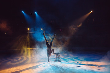 A man dancing in the circus arena. © davit85