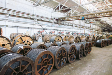 Wire rod, fittings in warehouses. industrial storehouse at the metallurgical plant.