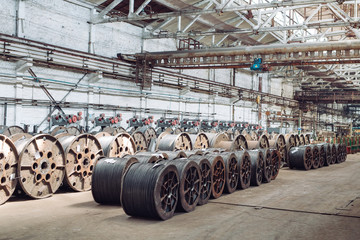 Wire rod, fittings in warehouses. industrial storehouse at the metallurgical plant.