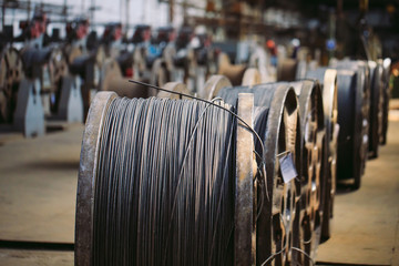 Wire rod, fittings in warehouses. industrial storehouse at the metallurgical plant.