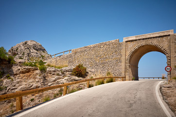Fototapeta premium Picture of a mountain road stone overpass, Mallorca, Spain.