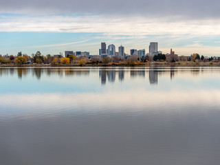 Fototapeta na wymiar Downtown Denver Skyline Reflected on Park Water on a Cloudy Fall Day