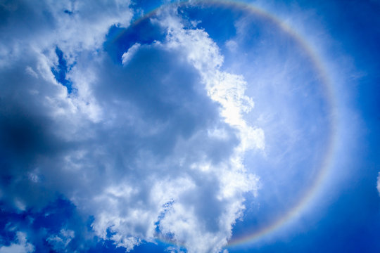 Halo Solar. Circle-shaped rainbow around the sun photographed in Brazil.