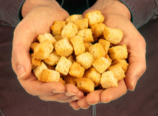 MAN HOLDING CROUTONS