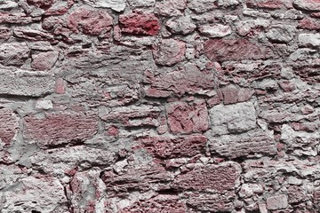 Obraz premium red scratched castle wall masonry texture - beautiful abstract photo background