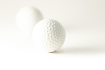 Golf ball on white background