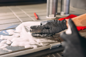 Car chemist. Chemical treatment of the car trunk.