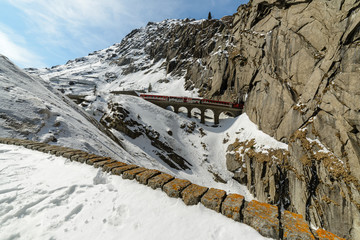 Devils Bridge Teufel Brug near Suvorov Suworow monument in Reuss river canyon gorge on a clear winter day