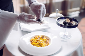 Pasta with truffles, typical autumn dish.Restaurant menu dish.