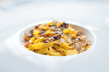 Pasta with truffles, typical autumn dish.Restaurant menu dish.