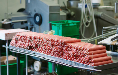 Making sausages, food production in the factory.