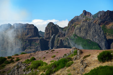 Fototapeta premium Mountain range on Pico do Arieiro against blue sky