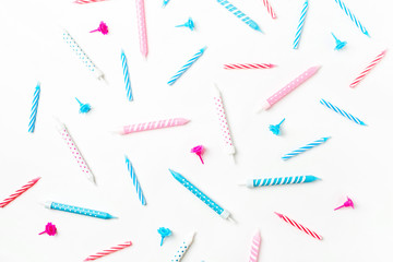 Pattern made of birthday party pink and blue candles. Holiday concept