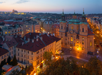 Prague - The St. Nicholas church,   Staromestske square and Old Town at dusk.