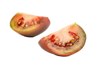 Fototapeta na wymiar Two slices kumato tomato