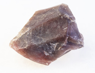 rough pink Flint (chalcedony) stone on white