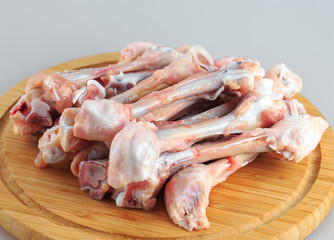  raw chicken bones on white background