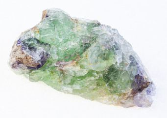 raw green Beryl with Alexandrite crystals on white