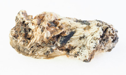 Perovskite in rough Clinochlore stone on white