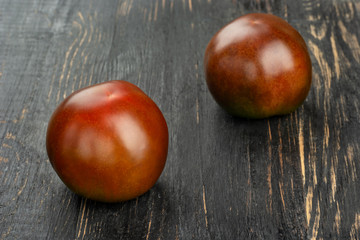 Two tomatoes kumato