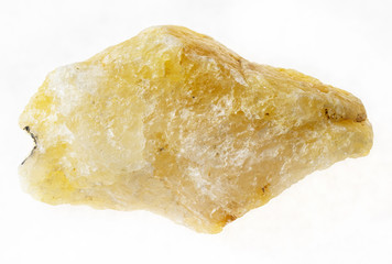 rough yellow calcite stone on white